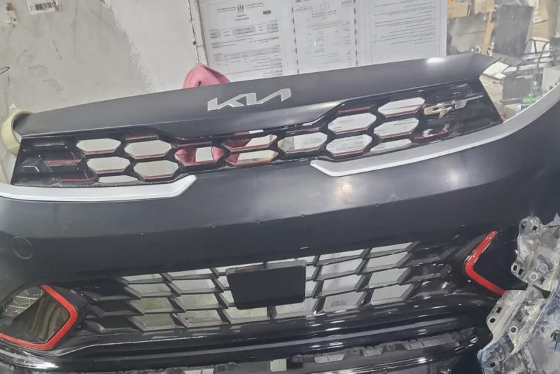 Front Bumper Assembly With Grille For Kia Sportage (nq5) 2022 2026 Auto spare parts in Sharjah Industrial Area 6, Sharjah