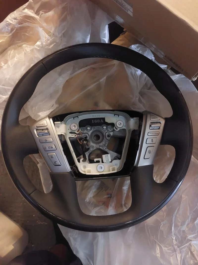 Multifunction Steering Wheel With Controls Nissan Patrol 2008+ Auto spare parts in Al Qusais Industrial Area 5, Dubai